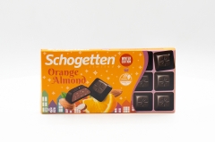 Шоколад Schogetten темный с апельсином и кусочками миндаля 100 гр