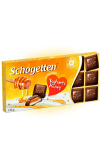 Молочный шоколад Schogetten с начинкой из обезжиренного йогурта и гранулами меда 100 гр